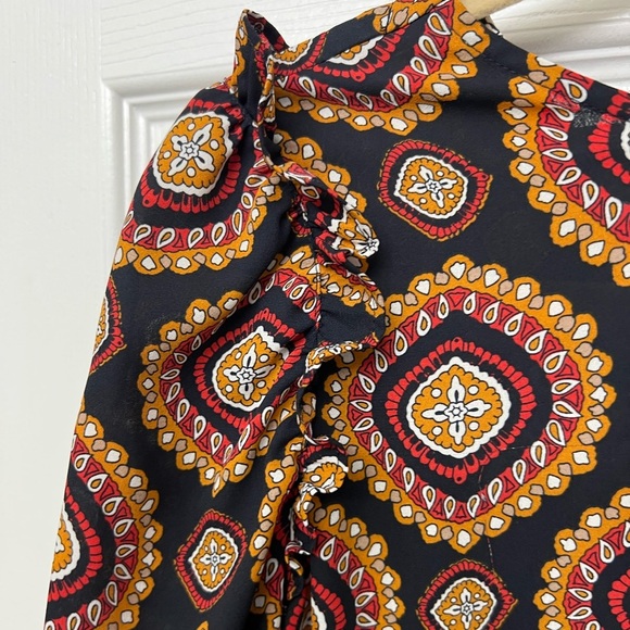 LOFT multi-colored blouse with ruffle detail at shoulder and cut-out at back. - Picture 3 of 5